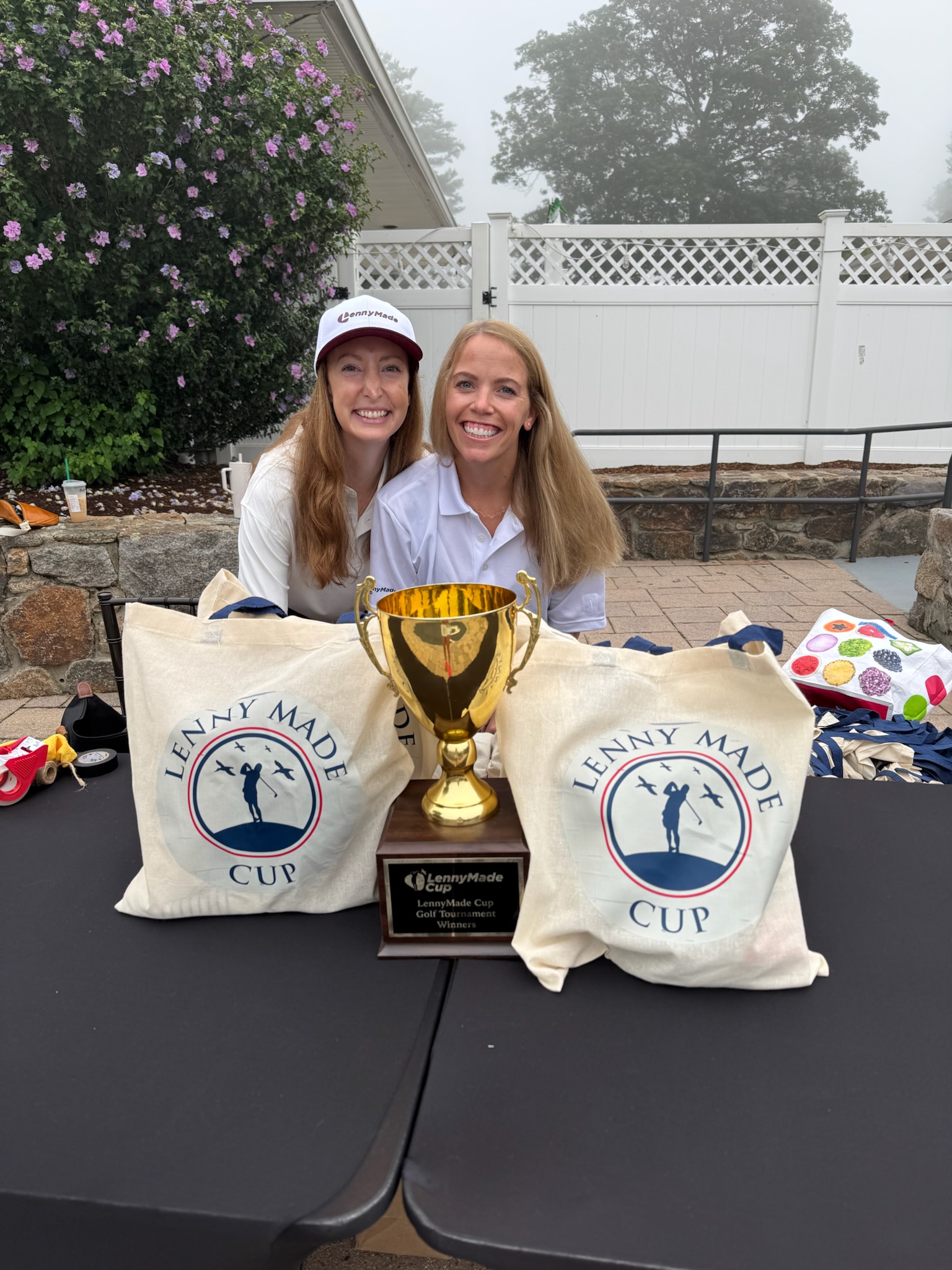 Blue background with piggy bank tipped over spilling coins